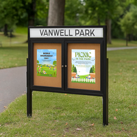 Free-Standing, Two Door 48x48 Outdoor Cork Bulletin Board with Personalized Message Header and Smooth Radius Edge Metal Cabinet